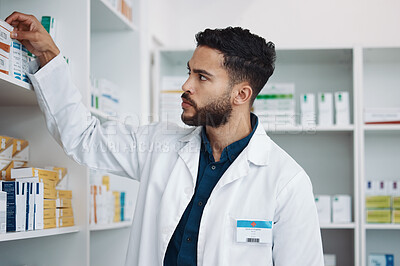 Buy stock photo Pharmacy, medical and shelf with man in store for healthcare, drugs dispensary and treatment prescription. Medicine, pills and shopping with pharmacist for check, label information and product
