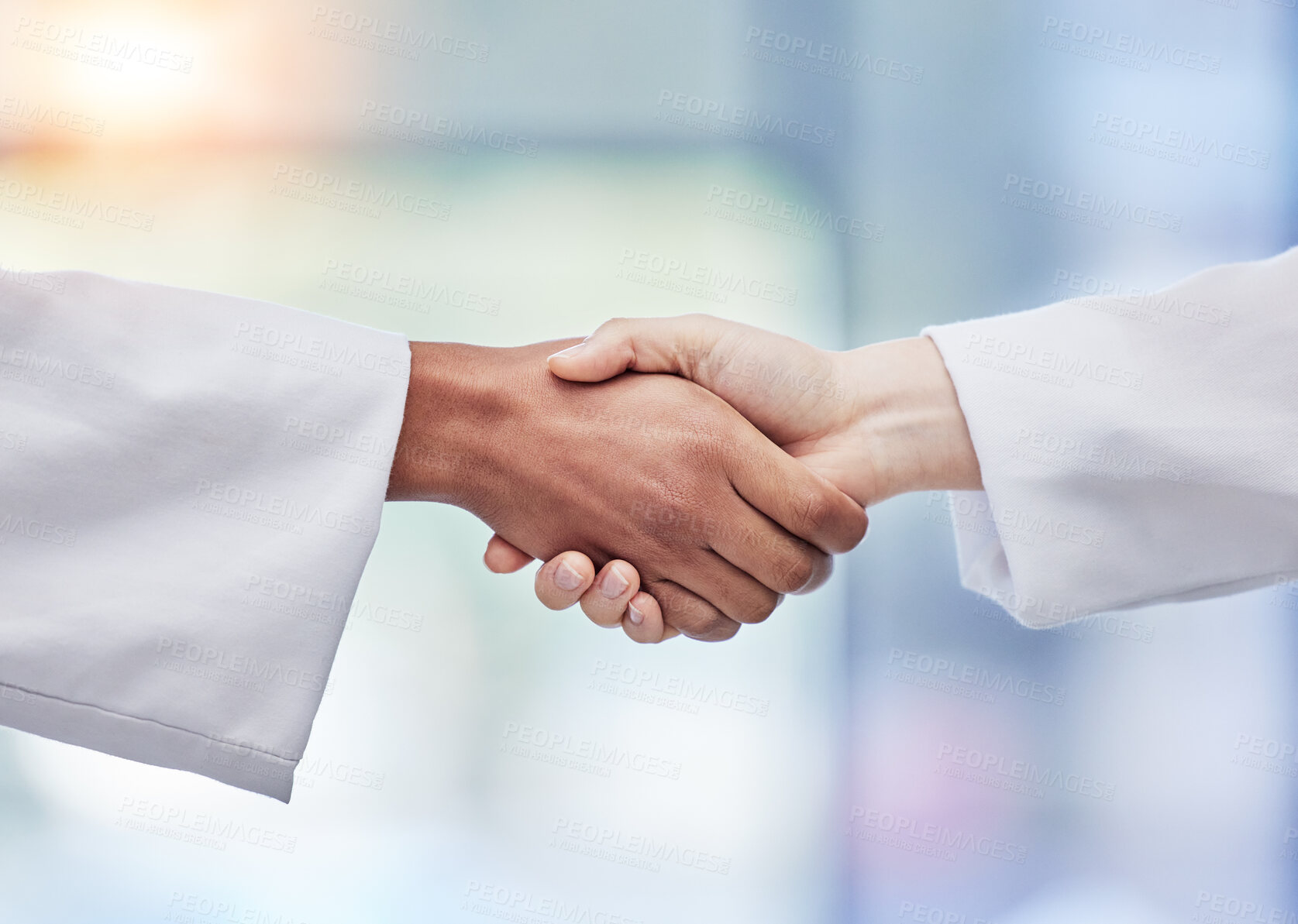 Buy stock photo Doctors, handshake and healthcare partnership in agreement, teamwork deal or collaboration. Medical professionals shaking hands in meeting, greeting and success of trust, thank you or consulting help
