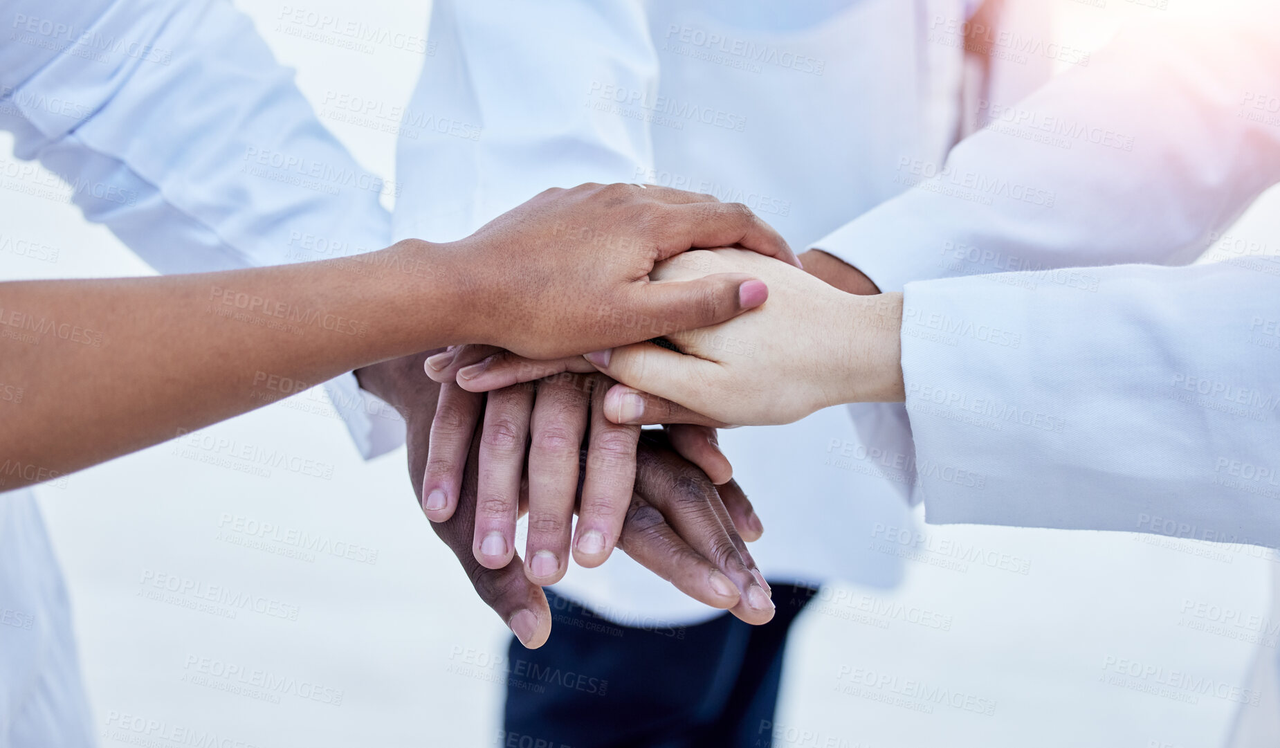 Buy stock photo Support, teamwork and medical with hands of doctors for community, diversity and solidarity. Healthcare, synergy and stack with group of people for mission, medicine and motivation in hospital