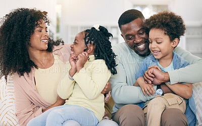 Buy stock photo Happy, love and black family bonding on the sofa together in the living room of their modern home. Happiness, smile and African children having fun with parents while sitting on the couch at house.