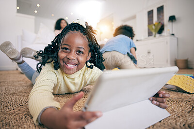 Buy stock photo Relax, smile and portrait of black girl and tablet on floor of living room for elearning, streaming or education app. Technology, happy or internet with child browsing online at home for digital game