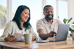 Budget, laptop and interracial couple planning home finance, savings or mortgage and taxes together in the living room. Couch, sofa and people review financial insurance document or paperwork