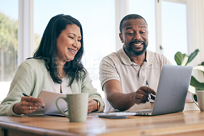 Buy stock photo Budget, laptop and interracial couple planning home finance, savings or mortgage and taxes together in the living room. Couch, sofa and people review financial insurance document or paperwork