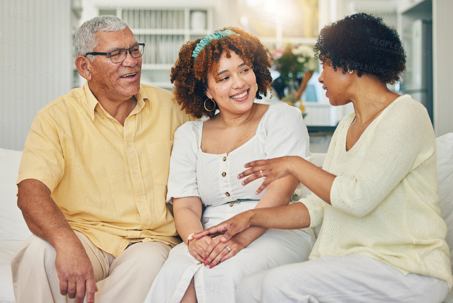 Buy stock photo Family, woman and home with senior people talking on a living room sofa in a house. Smile, communication and love of a female with elderly parents conversation in a lounge together on a couch 