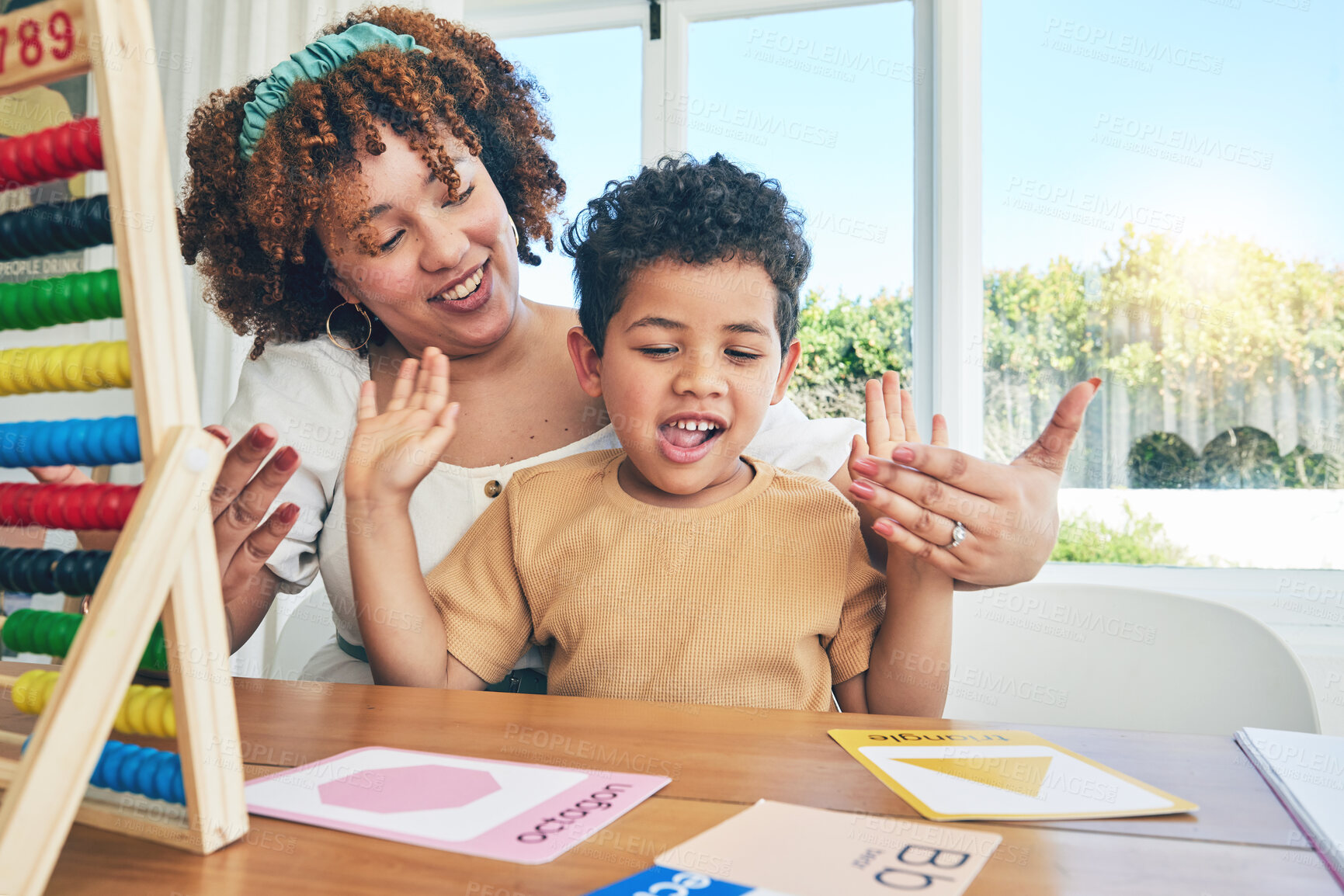 Buy stock photo Learning, happy and education with mother with son study for home schooling, kindergarten and tutor. Teaching, child development and lesson with black woman and child for language, math and creative 