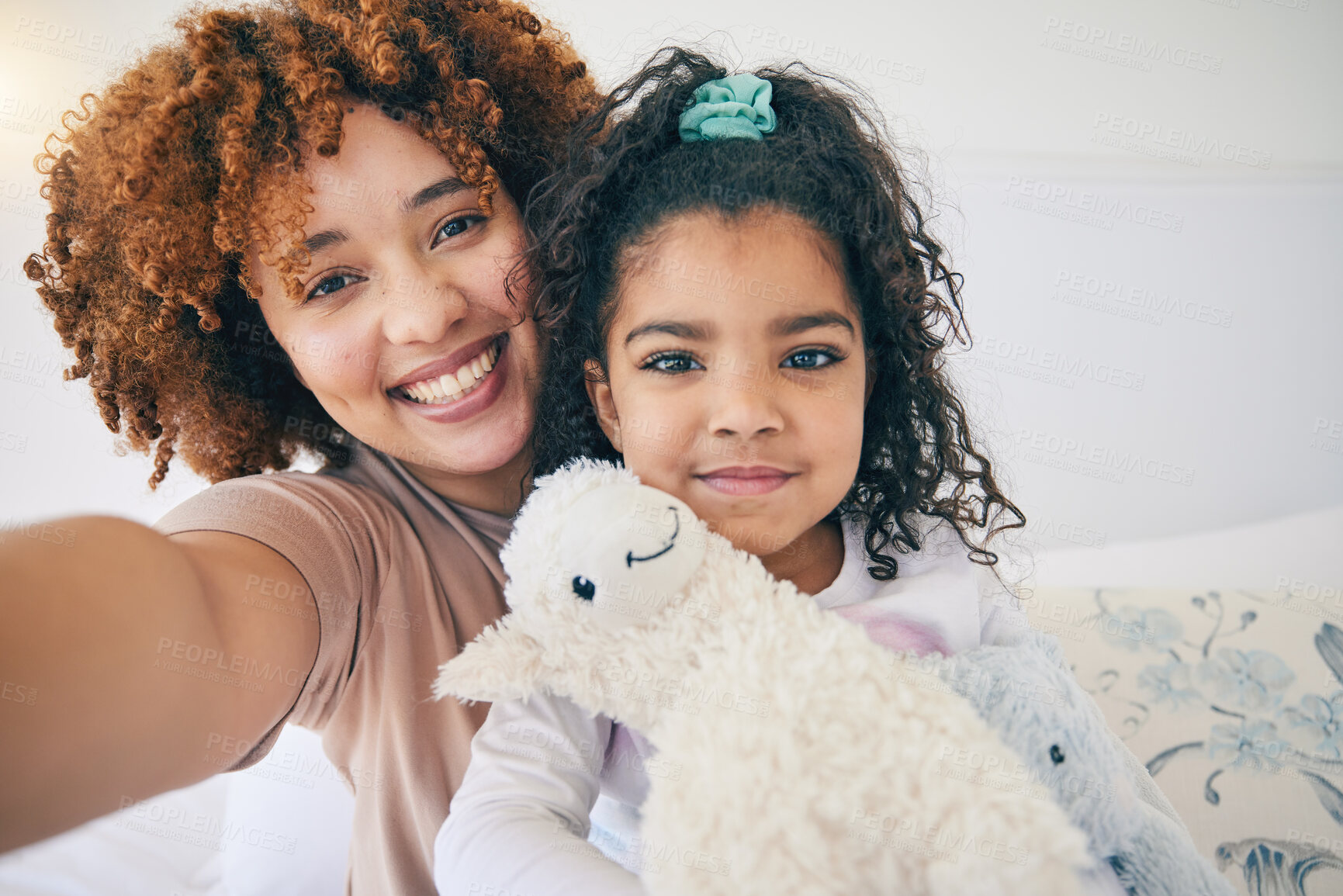 Buy stock photo Mother, home and young girl selfie on a bed in the morning with toy in a family bedroom. House, smile and happy mom with a child taking a picture for social media with mama love and care for her kid