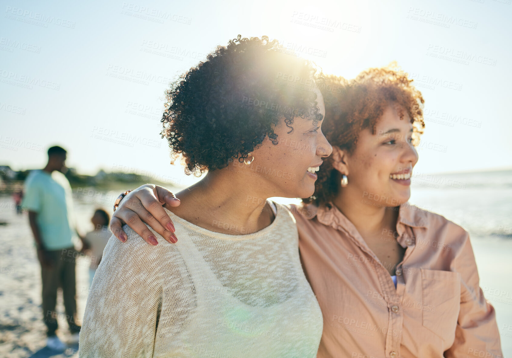 Buy stock photo Love, beach and mother with her adult daughter walking by the ocean together while on vacation. Happy, smile and mature woman bonding with her female child by the sea while on holiday or weekend trip