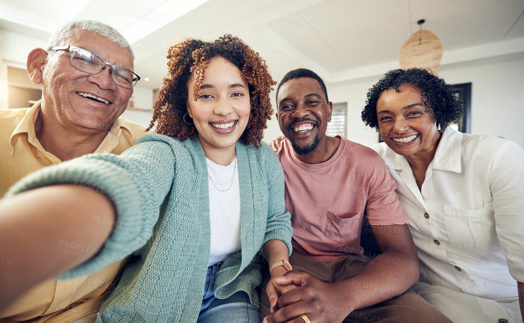 Buy stock photo Happy, smile and selfie with black family in living room for social media, bonding and relax. Happiness, picture and generations with couple and elderly parents at home for memory, support or weekend