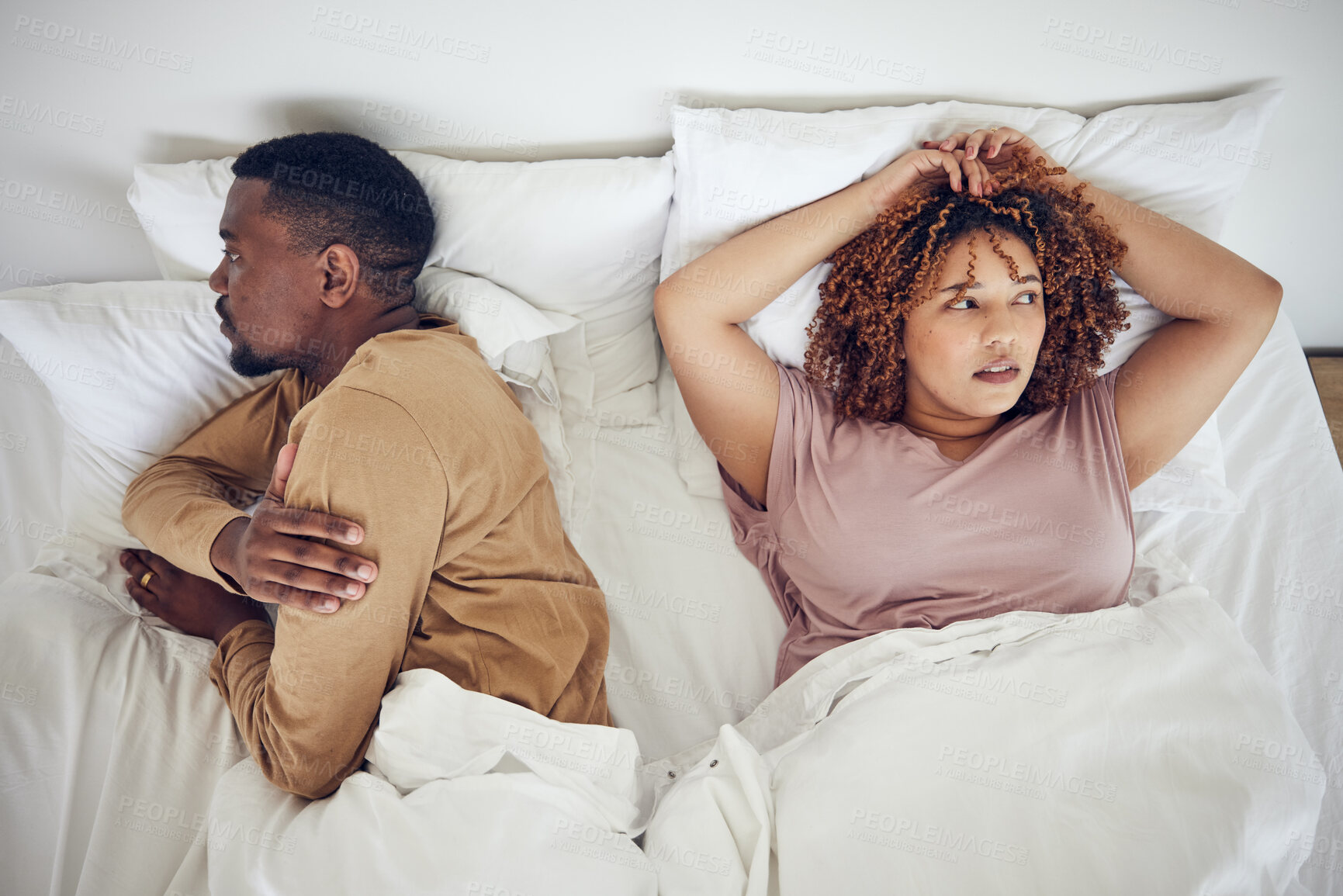 Buy stock photo Couple fight, angry and bedroom with a black woman and man feeling frustrated in a bed. Home, conflict and relationship problem from above of a marriage fail and divorce issue in the morning