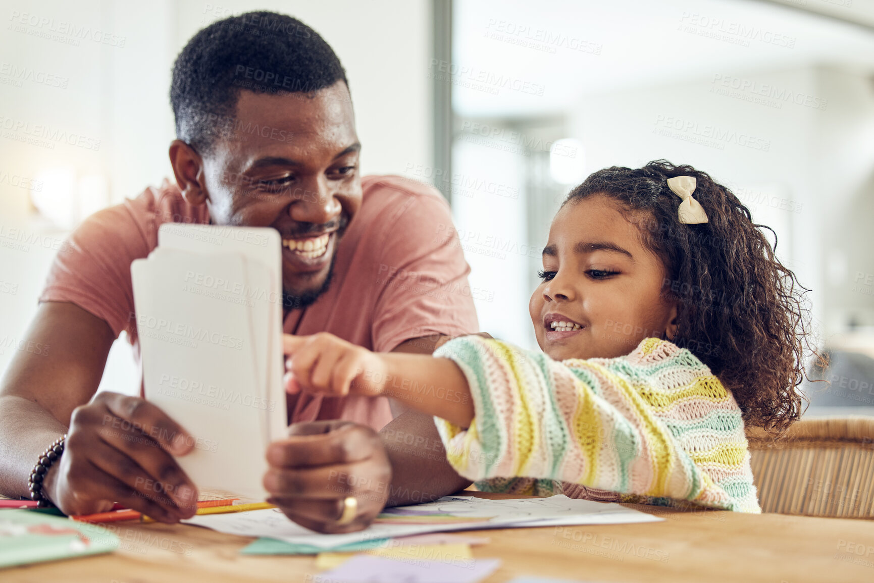 Buy stock photo Home school, learning and father helping his child with flash cards, homework or studying. Education, knowledge and African man teaching his young girl kid with reading or an academic assignment.