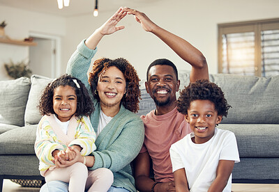 Buy stock photo Family, portrait and security, love and insurance for protection with parents and children. Hands together, roof and happy people in living room, unity and safety for life and home cover with smile