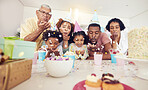 Birthday, party and confetti with black family in kitchen for celebration, bonding and affectionate. Happiness, excited and grandparents with parents and child at home for surprise, fun and event 