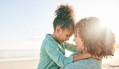 Buy stock photo Family, mother and kid hug at beach, travel and summer with sunshine lens flare and together outdoor. Trust, support with woman and girl smile on vacation, love and care in nature with happiness