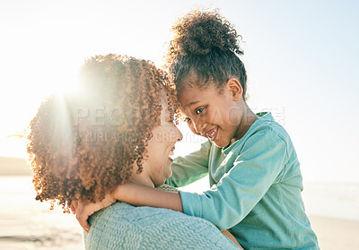 Buy stock photo Family, mother and child hug at beach, travel and summer with sunshine lens flare and together outdoor. Trust, support with woman and girl smile on vacation, love and care in nature with happiness