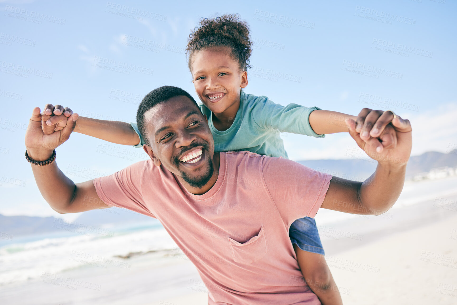 Buy stock photo Child, black man and piggy back at ocean on playful family holiday in Australia with freedom, fun and energy. Travel, fun and happy father and girl with smile playing and bonding together on vacation