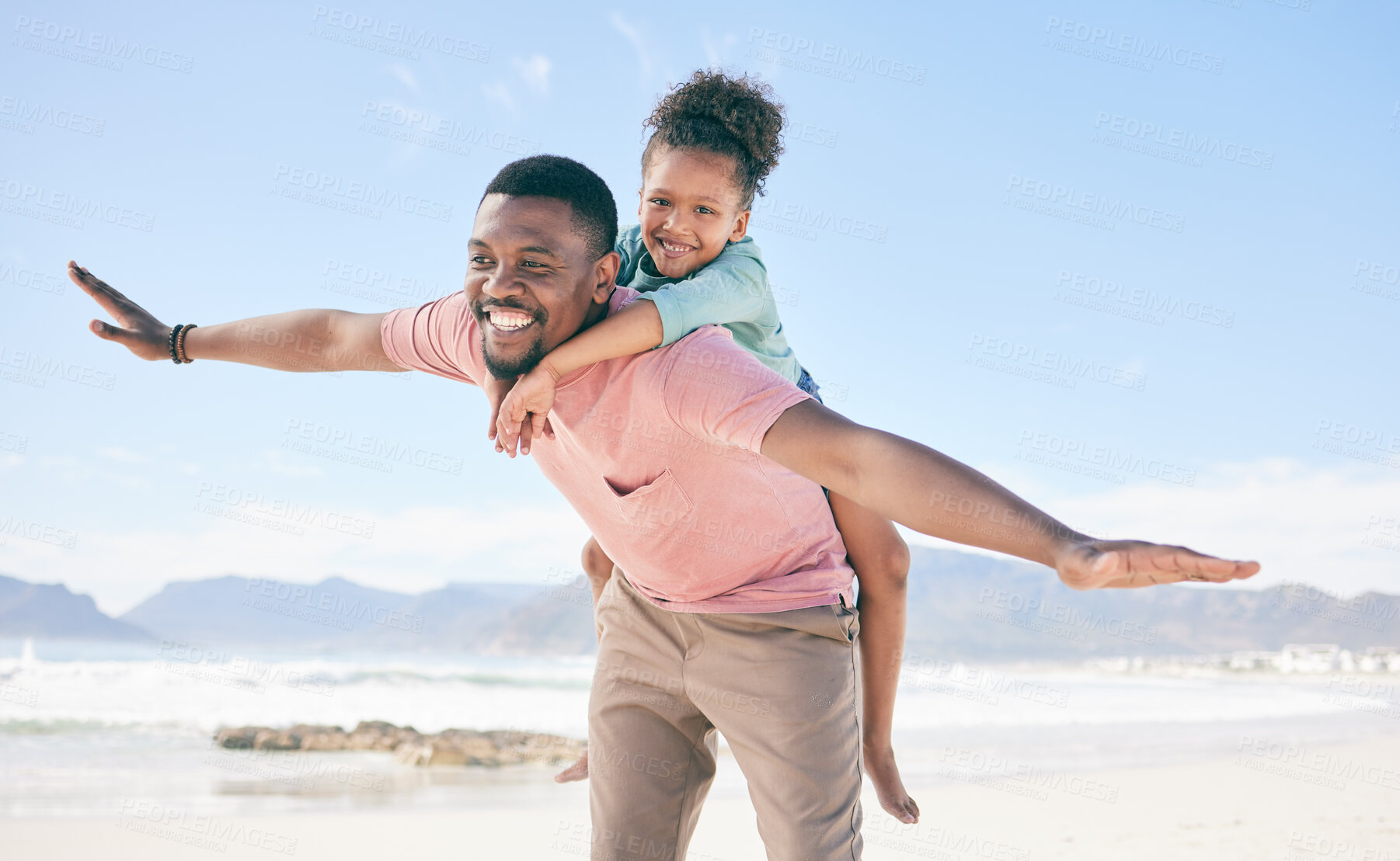 Buy stock photo Beach, black man flying with child on back and playful family holiday in Australia with freedom and energy. Travel, fun and happy father and girl with smile playing and bonding together on vacation.