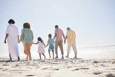 Buy stock photo Family, walking on beach sand and holding hands, generations and people, grandparents with parents and kids. Together outdoor, unity and trust, travel to Bali with love, care and bond with back view 