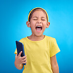 Phone, scream and child on blue background with attitude, upset and lose online game, network or internet. Technology, bad behaviour and face of girl upset, angry and shout with smartphone in studio