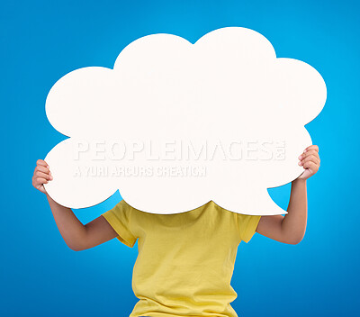 Buy stock photo Speech bubble space, thinking and child with idea, opinion and news announcement on blue background studio. Talking, social media mockup and kid with board, poster or cardboard banner for information