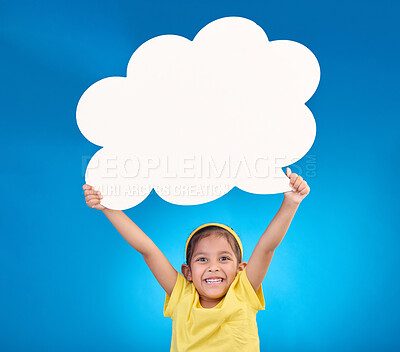 Buy stock photo Speech bubble, thinking and portrait of child with idea, opinion and announcement on blue background studio. Talking, speaking mockup and excited, happy and young girl with smile, poster and banner