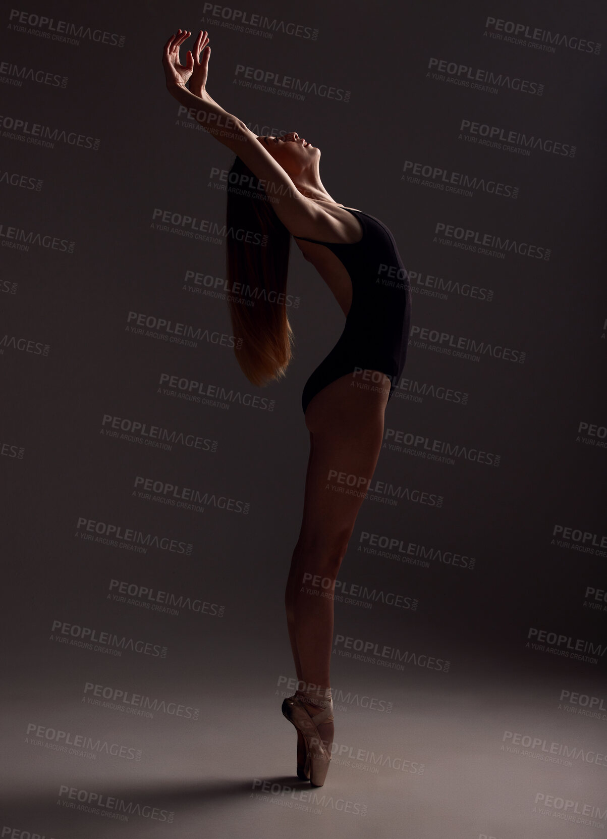 Buy stock photo Ballet, woman and artist training, artistic and commitment with girl against a dark studio background. Female performer, lady and ballerina with creativity, happiness and practice for performance