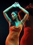 Green light, dance and double exposure of Indian woman with beauty and fashion brand aesthetic. Creative lighting, young female and model with dark background in studio with modern style and dancing