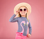 Vacation, portrait of happy child with sunglasses and hat in studio with fun clothes isolated on pink background. Summer, holiday and fashion, girl in Australia excited for travel with smile on face.