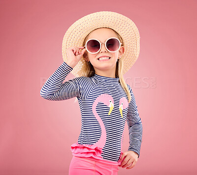 Buy stock photo Vacation, portrait of happy child with sunglasses and hat in studio with fun clothes isolated on pink background. Summer, holiday and fashion, girl in Australia excited for travel with smile on face.