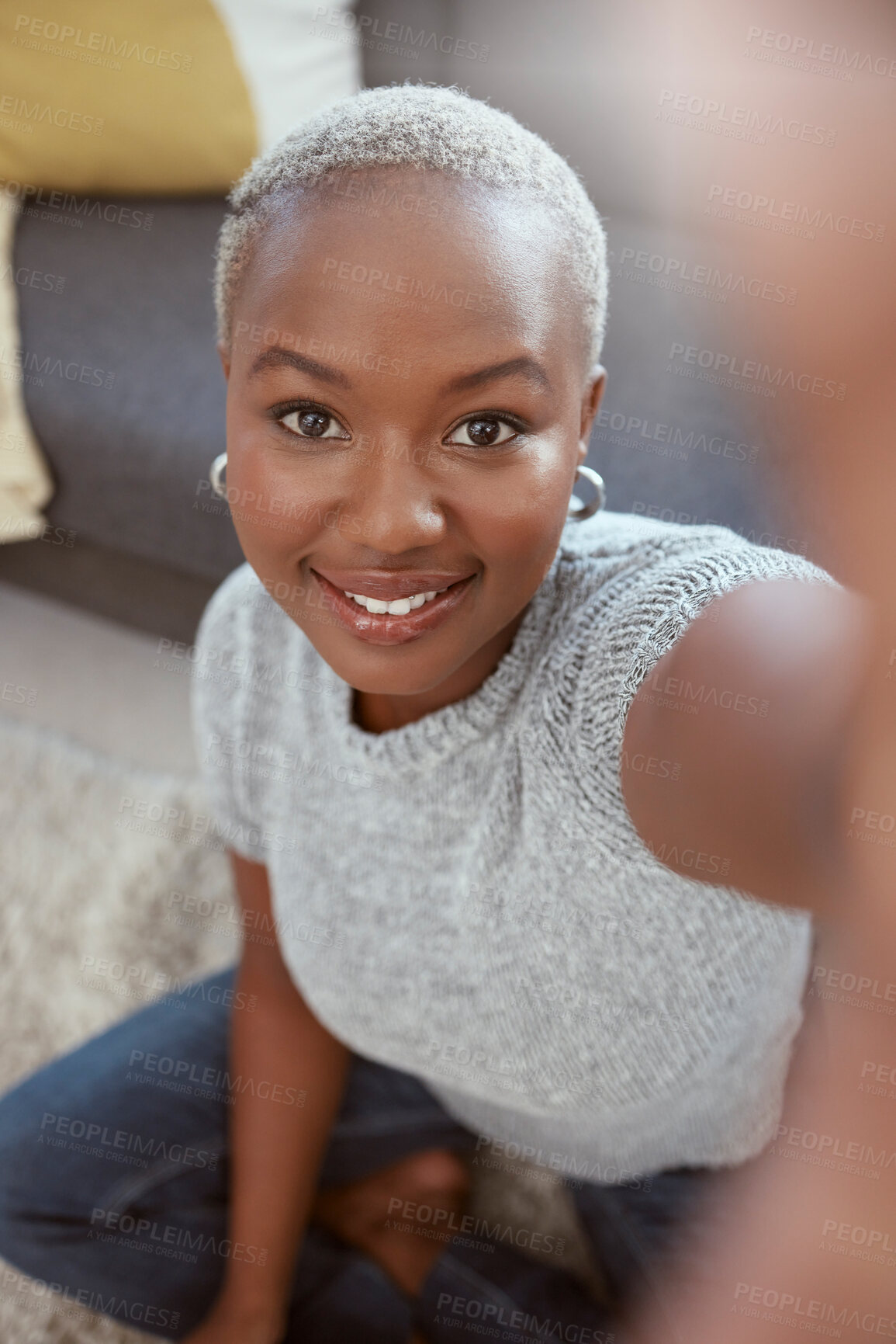 Buy stock photo Portrait, black woman and selfie in home, smile and living room for social media, relax and live streaming. Face of happy female influencer, profile picture and video call in house, lounge or vlogger