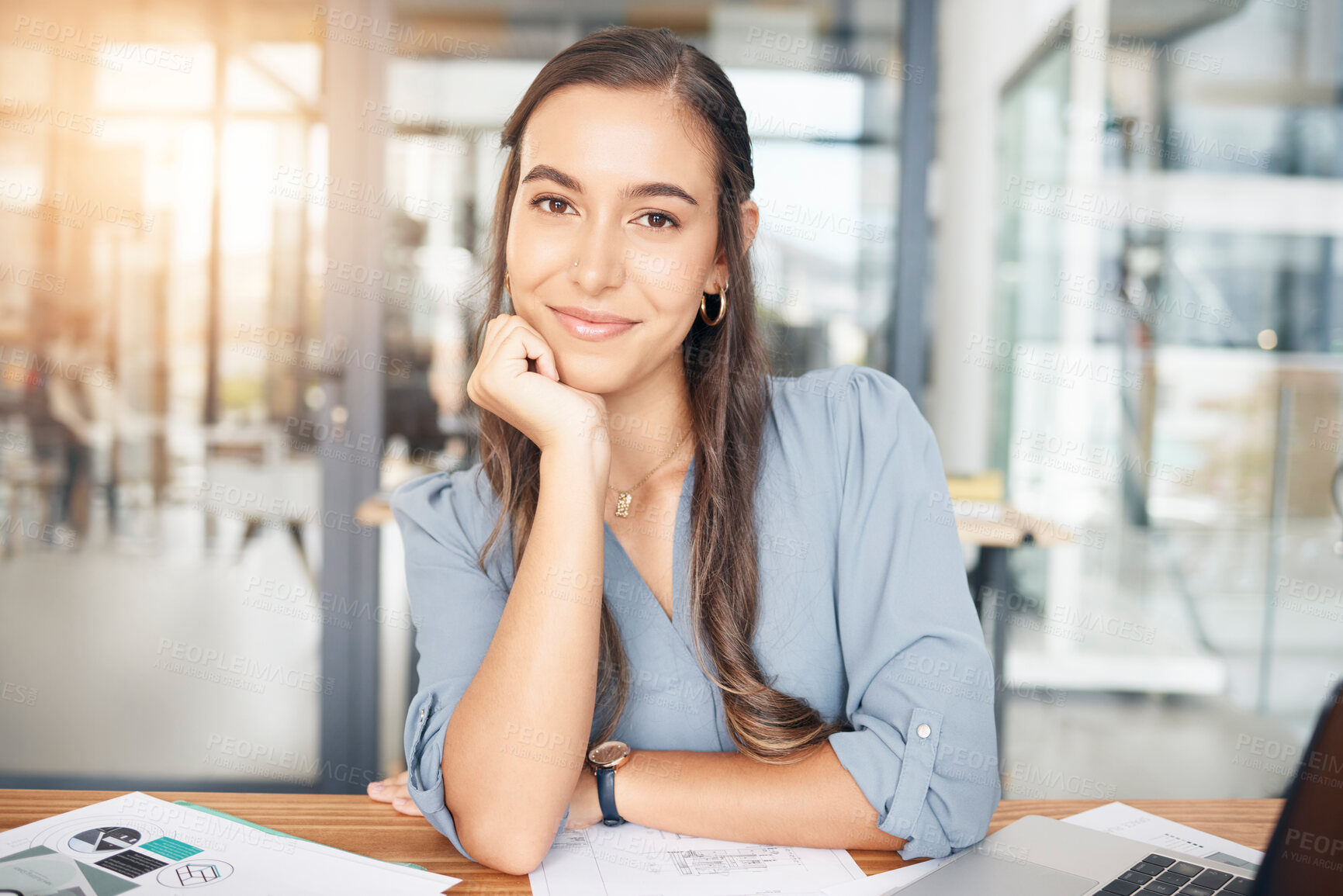 Buy stock photo Woman designer, portrait and smile at desk in office for paperwork, pride or expert engineering in Canada. Happy young female architect at desk with confidence of planning strategy in startup company