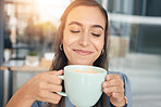 Business woman, face and drinking coffee in office, company and startup with smile, lunch break and happiness. Happy female worker enjoy cup of tea, cappuccino and latte while relaxing in workplace