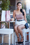 Shopping, weekend and portrait of a woman with coffee from a cafe, relaxing and enjoying a drink. Smile, happy and young girl at a restaurant for a beverage after retail therapy and consumerism