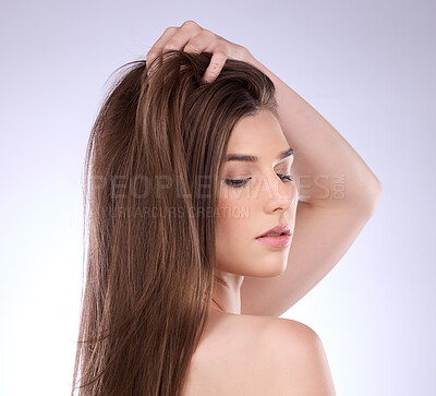 Buy stock photo Face, beauty and hair care of woman in studio isolated on a gray background. Skincare, makeup cosmetics and female model with salon treatment for healthy keratin, balayage or natural hairstyle growth