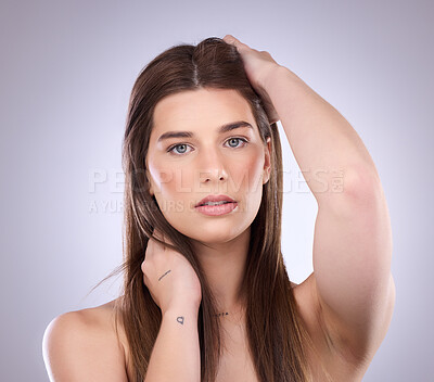 Buy stock photo Face portrait, beauty and hair care of a woman in studio isolated on a background. Natural cosmetics, growth and confident female model with salon treatment for healthy keratin, texture and hairstyle