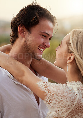 Buy stock photo Couple, love and hug outdoor with a smile, care and romance on a date in nature. Young man and woman happy together on valentines day with trust, peace and freedom or support with a smile in forest