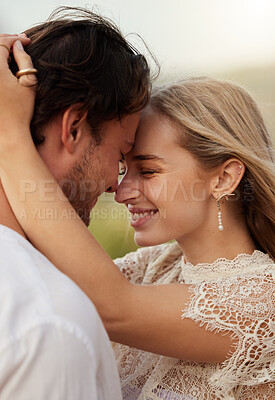 Buy stock photo Love, smile and hug with couple in nature for romance, bonding and affectionate together. Hugging, happiness and vacation with man and woman in embrace on date for sunset, anniversary or summer break