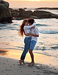 Couple hug on beach, freedom and travel, love and commitment in relationship, adventure and vacation. Trust, partnership and care with people outdoor, romance and happiness at sunset with sea waves