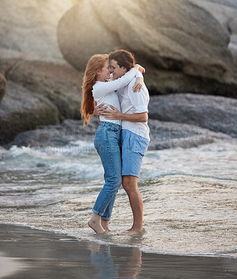 Buy stock photo Love, hug and happy with couple at beach for romance, relax and vacation trip. Travel, sweet and cute relationship with man and woman holding in embrace on date for summer break, trust and bonding