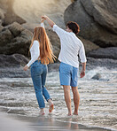 Love, dance and happy with couple at beach for romance, relax and vacation trip. Travel, sweet and cute relationship with man and woman holding hands on date for summer break, trust and bonding
