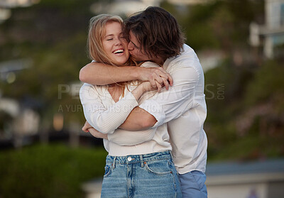 Buy stock photo Couple hug and kiss on beach, travel with love and commitment in relationship, adventure and romance. Trust, partnership and care with young people outdoor, tropical holiday and happiness on date