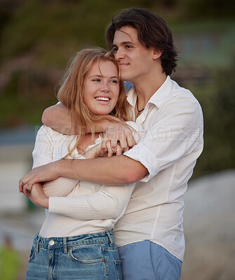 Buy stock photo Couple hug on beach, travel and content with love and commitment in relationship, adventure and romance. Trust, partnership and care with young people outdoor, tropical holiday and happiness on date