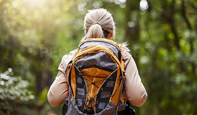 Buy stock photo Backpack, woman in forest and hiking for adventure, fitness and workout for fresh air, balance and wellness. Female, lady or hiker with equipment, walking or exercise with healthy lifestyle in nature