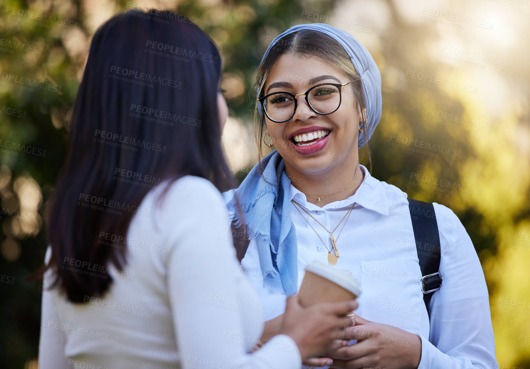 Buy stock photo Happy, break or university friends at park on campus for learning, education or future goals together. Girls Muslim or students relaxing with school books meeting for research or college knowledge