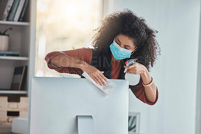 Buy stock photo Covid, business and a black woman cleaning her computer in the office for health, safety or control. Compliance, bacteria and regulations with a female employee wiping her desktop pc for disinfection