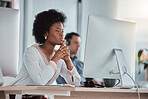 Thinking, focus or black woman on computer in office for online project, proposal or planning digital ideas. Concentration or thoughtful worker working on pc for internet, network or website research