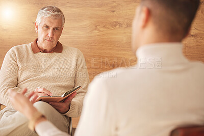 Buy stock photo Psychologist, listening or man consulting in therapy, mental healthcare or support in consultation. Back of patient talking to senior therapist writing notes for medical help or psychology advice