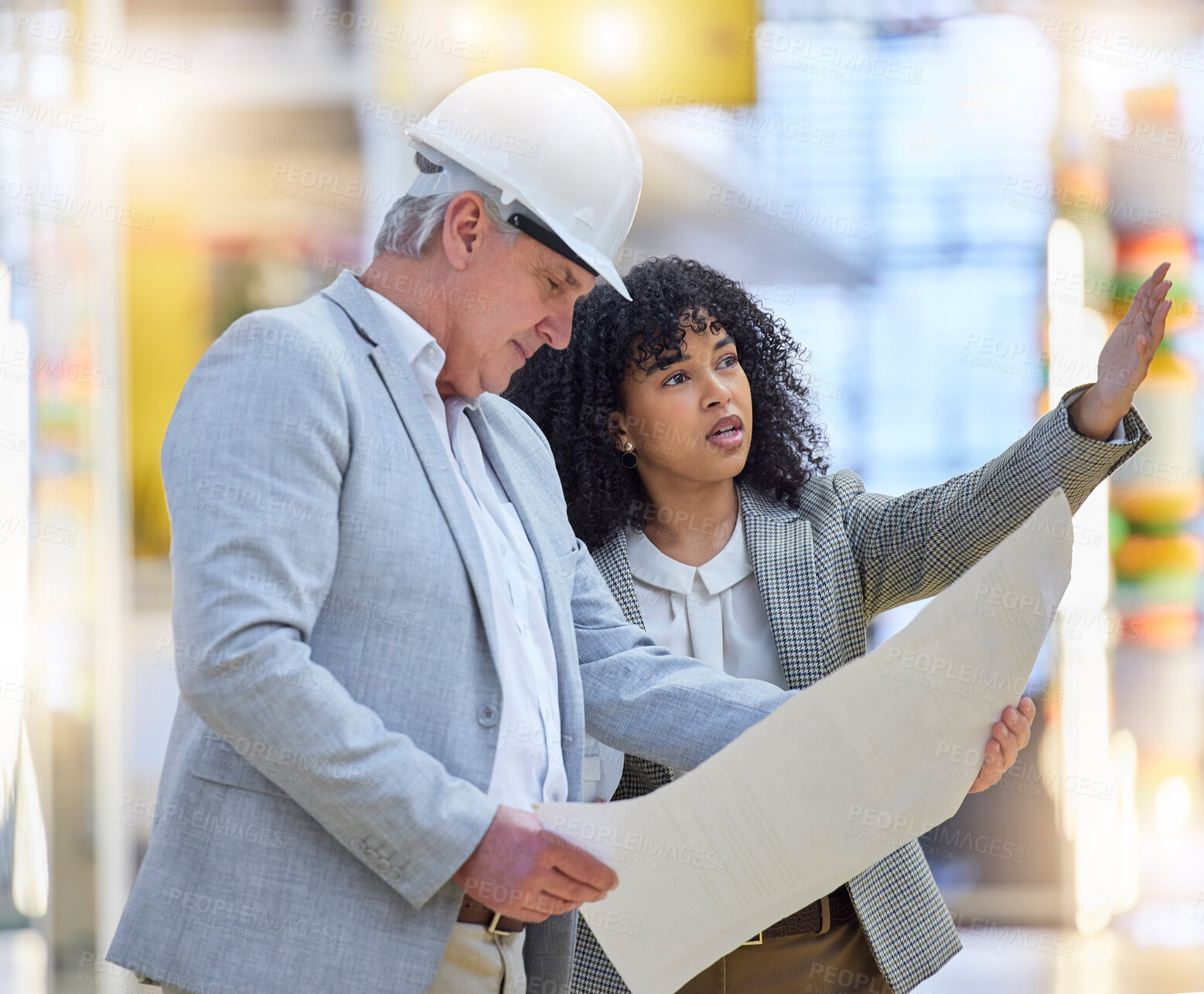 Buy stock photo Man, woman and construction team pointing at building site, blueprint ideas and discussion of design. Diversity, project management and architecture for infrastructure, engineering and floor planning