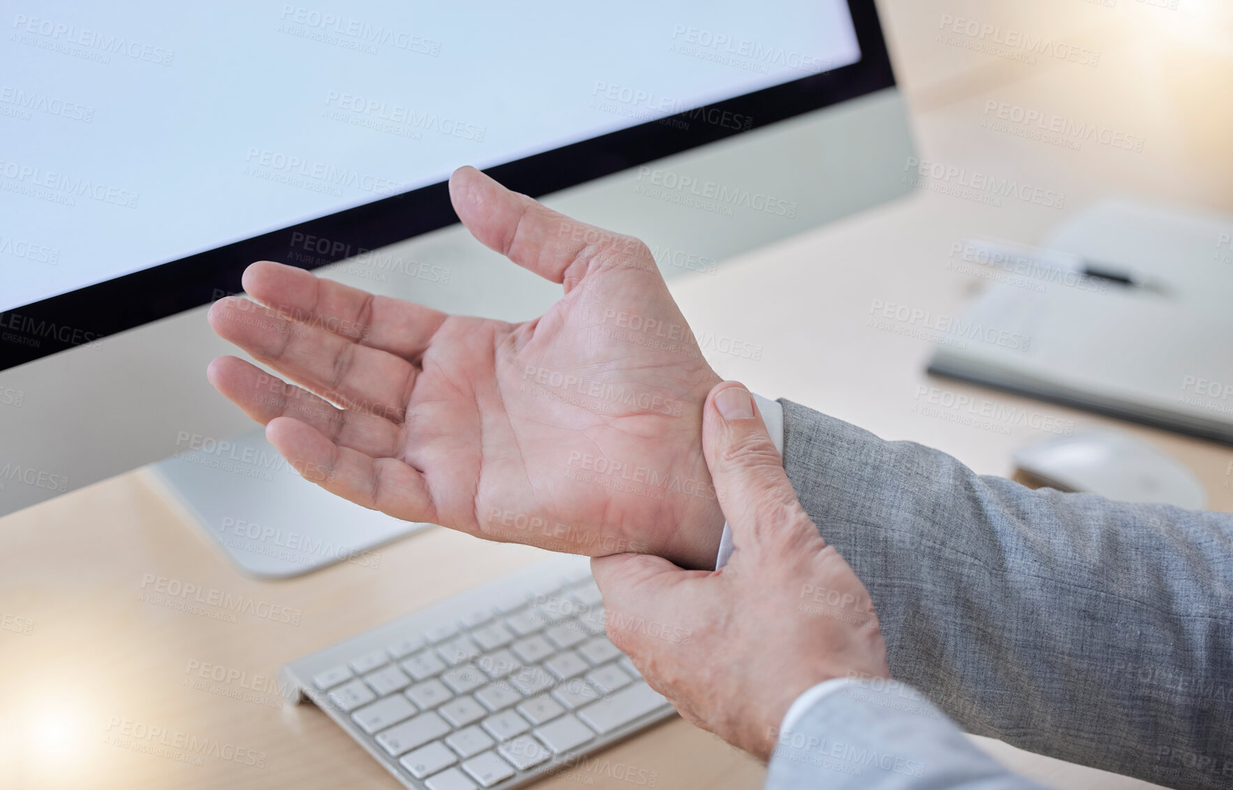 Buy stock photo Hand, arthritis and carpal tunnel with a business man in his office, sitting at a desk suffering from joint pain. Stress, medical or anatomy and a male employee struggling with osteoporosis or injury