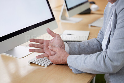 Buy stock photo Hand, carpal tunnel and joint pain with a business man in his office, sitting at a desk suffering from arthritis. Stress, medical or anatomy and a male employee struggling with osteoporosis or injury