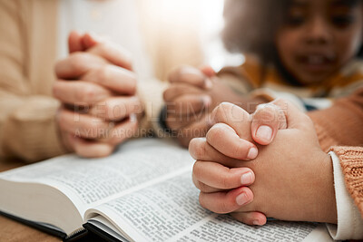 Buy stock photo Bible, praying or hands of woman with children siblings for worship, support or hope in Christianity. Kids education, prayer or mother studying, reading book or learning God gospel in religion blur